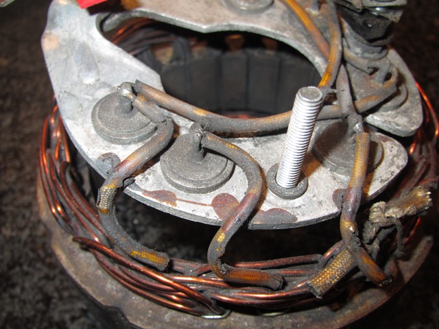 The stator's three field coils attached the stator to the rectifying diode housing