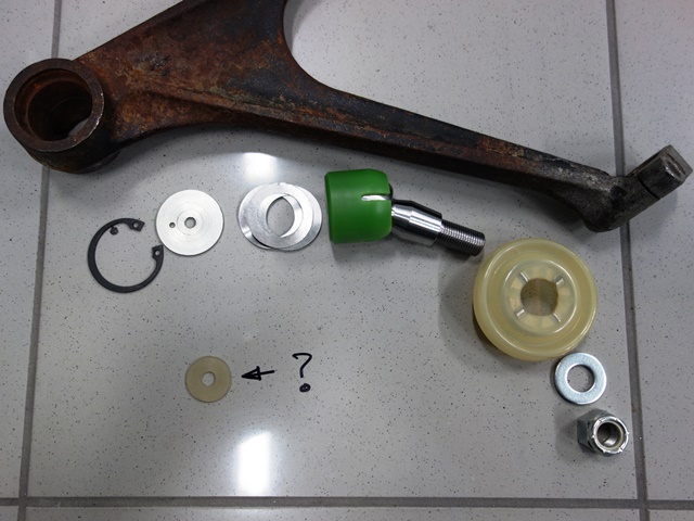 The components of the CMC ball joint kit, including the mystery small nylon washer