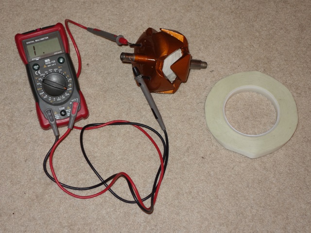 A multimeter confirmed the field winding has not shorted with the rotor body. The field winding resistance was also measured at 4.2 ohms