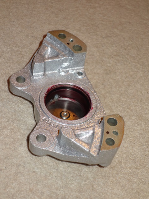 The piston bore and seal recess were covered with Girling Red Rubber grease before the seal was inserted into the recess