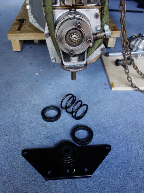The gearbox mounting bracket and damping spring, which sits in two rubber mouldings