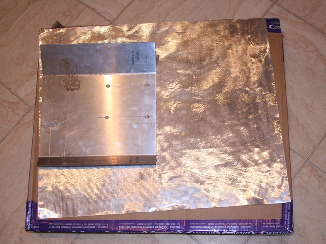 A sheet of Zircotec II was cut slightly oversize to cover the exhaust side of the heatshield